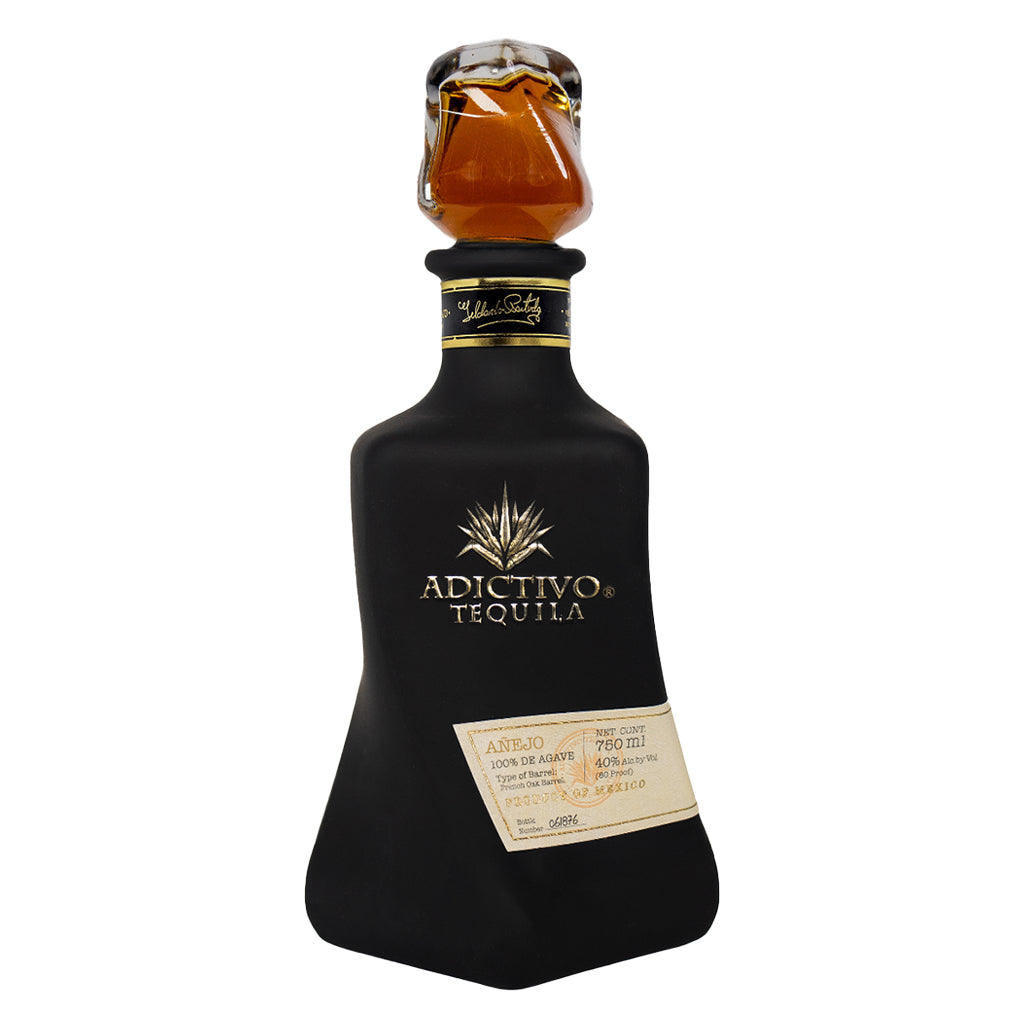 Adictivo Black Añejo Tequila on a white background.